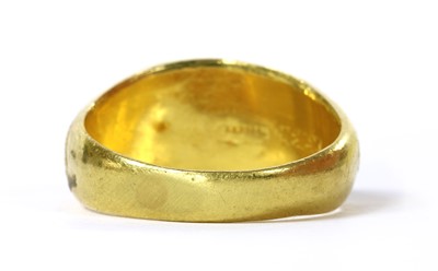 Lot 439 - A gold hollow domed ring