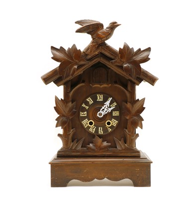 Lot 161 - A wooden Black Forest cuckoo clock