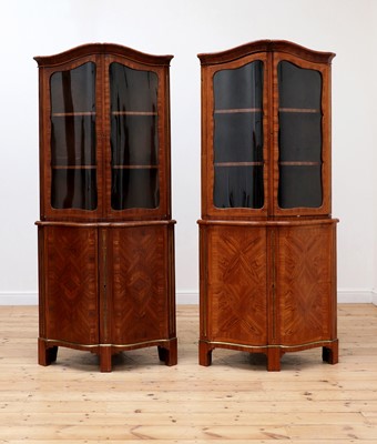 Lot 775 - A near pair of French Louis XVI-style kingwood corner cupboards