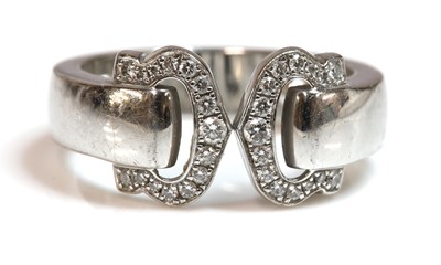 Lot 363 - An 18ct white gold diamond set 'C de Cartier' ring, by Cartier