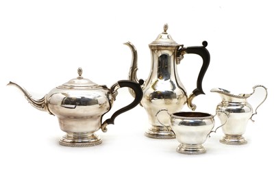 Lot 17 - A four piece silver tea and coffee service