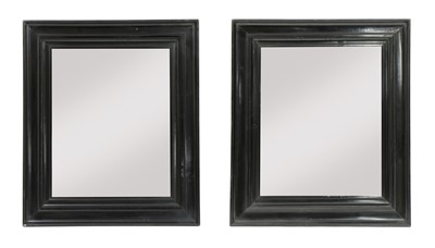 Lot 300 - A pair of ebonised mirrors