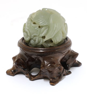 Lot 318 - A Chinese jade ball