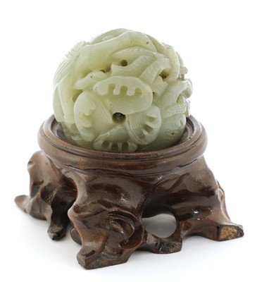 Lot 318 - A Chinese jade ball