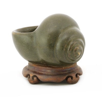 Lot 323 - A Chinese tea-glazed waterpot