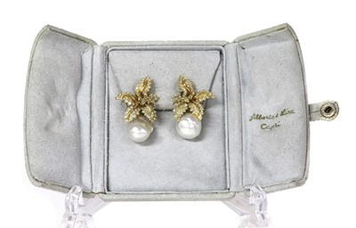 Lot 304 - A pair of Continental cultured South Sea pearl and diamond earrings