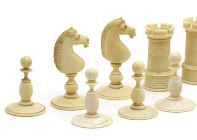 Lot 63 - A plain and stained ivory chess set