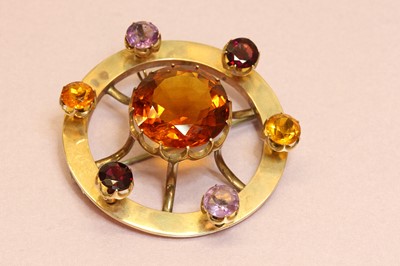 Lot 75 - A Scottish gold gemstone set wheel form brooch/pendant, c.1880