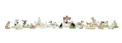 Lot 237 - A collection of pottery animal figures