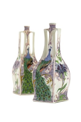 Lot 117 - A near pair of Rozenburg Den Haag twin-handled porcelain vases