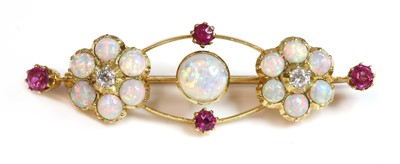 Lot 133 - A late Victorian diamond opal and ruby bar brooch
