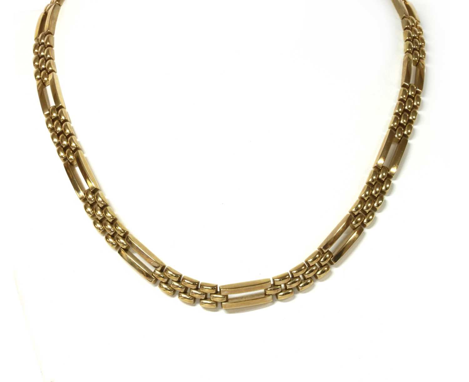 Lot 1075 - A 9ct gold brick link necklace