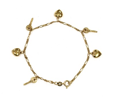 Lot 213 - A 9ct gold charm bracelet