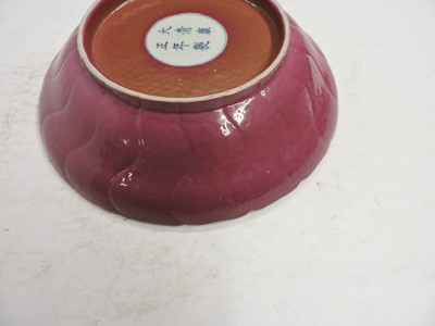 Lot 105 - A Chinese ruby pink enamelled dish