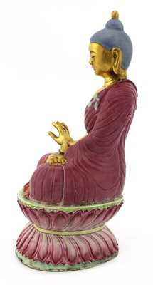 Lot 384 - A Chinese famille rose Buddha
