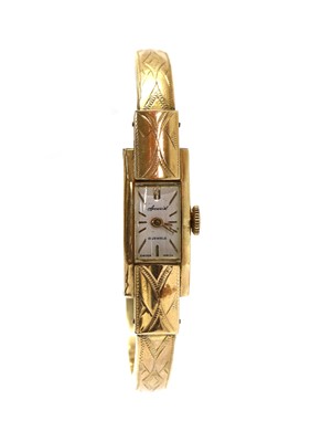 Lot 477 - A ladies’ gold Accurist mechanical bangle watch