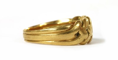 Lot 16 - An 18ct gold keeper ring