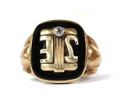 Lot 435 - A gold onyx and diamond signet ring