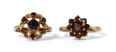 Lot 246 - Two 9ct gold garnet cluster rings