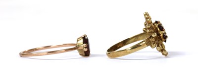 Lot 245 - A 9ct gold garnet cluster ring
