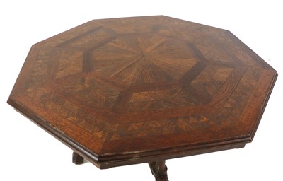 Lot 122 - A Howard & Sons oak octagonal centre table