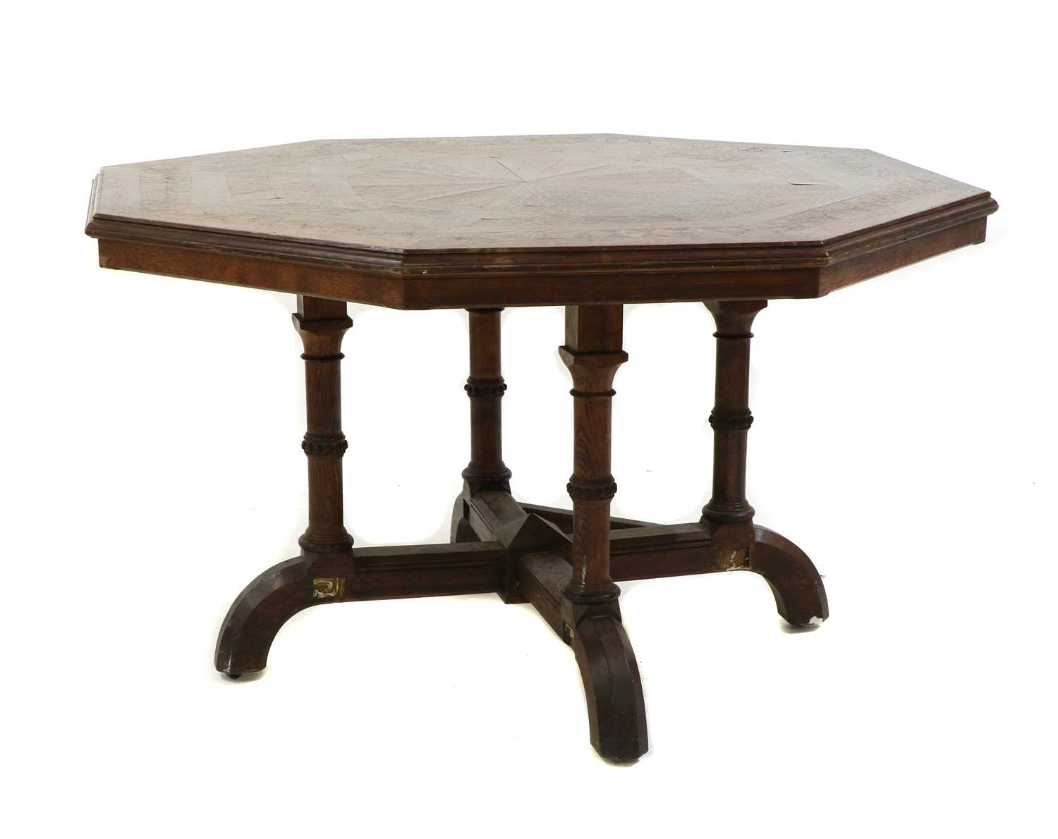Lot 122 - A Howard & Sons oak octagonal centre table