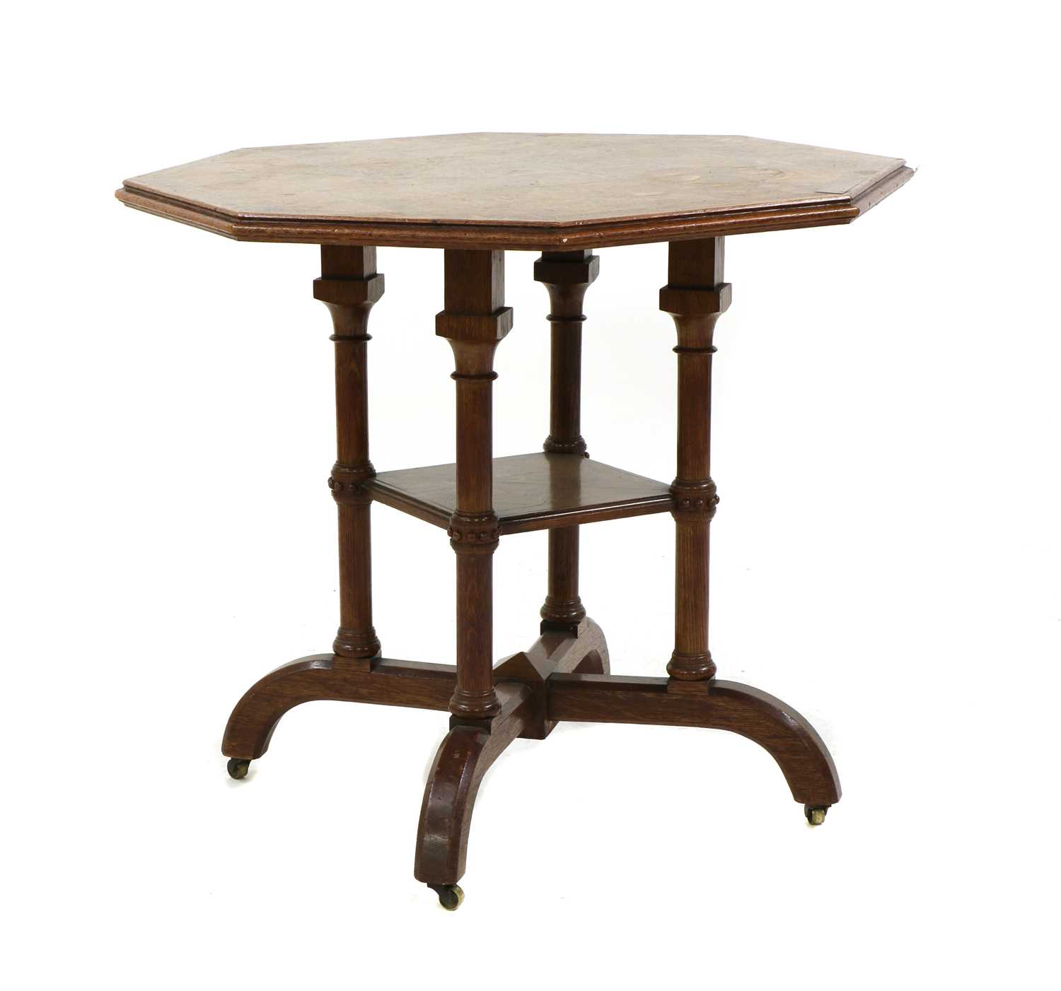 Lot 120 - A Howard & Sons oak octagonal centre table