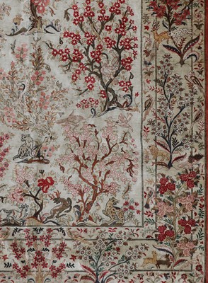 Lot 206 - A Persian silk rug