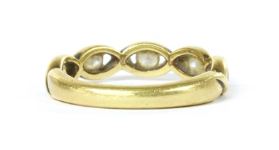 Lot 1101 - An 18ct gold five stone diamond ring