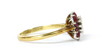Lot 1151 - An 18ct gold diamond and ruby cluster ring