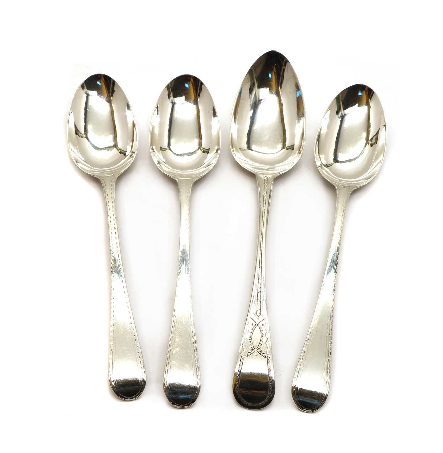 Lot 22 - A set of three George III Old English pattern silver tablespoons