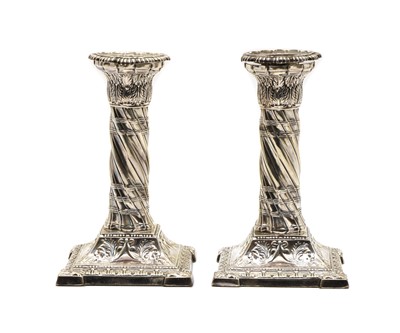 Lot 25 - A pair of Victorian silver dwarf candlesticks