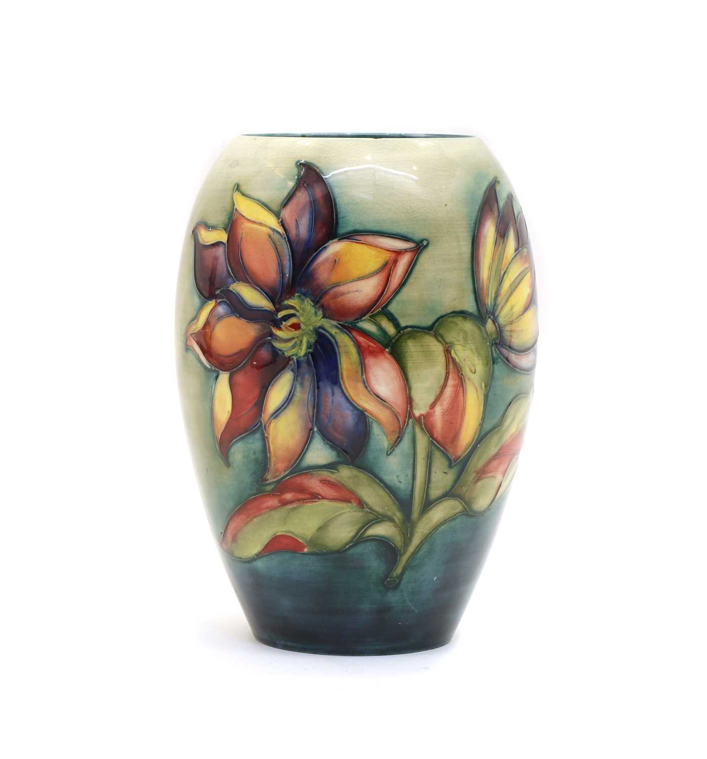Lot 73 - A Moorcroft tubeline decorated 'Dahlia' pattern vase