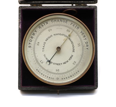 Lot 83 - A brass-cased marine holosteric or aneroid barometer