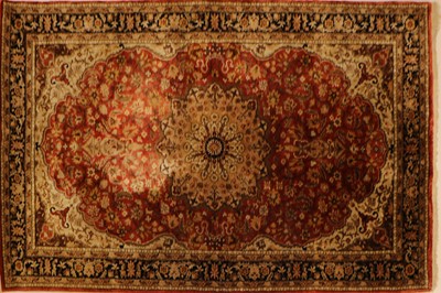 Lot 311 - A Chinese part silk rug