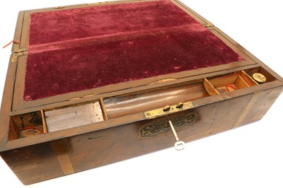 Lot 105 - A Victorian walnut and brass bound writing slope