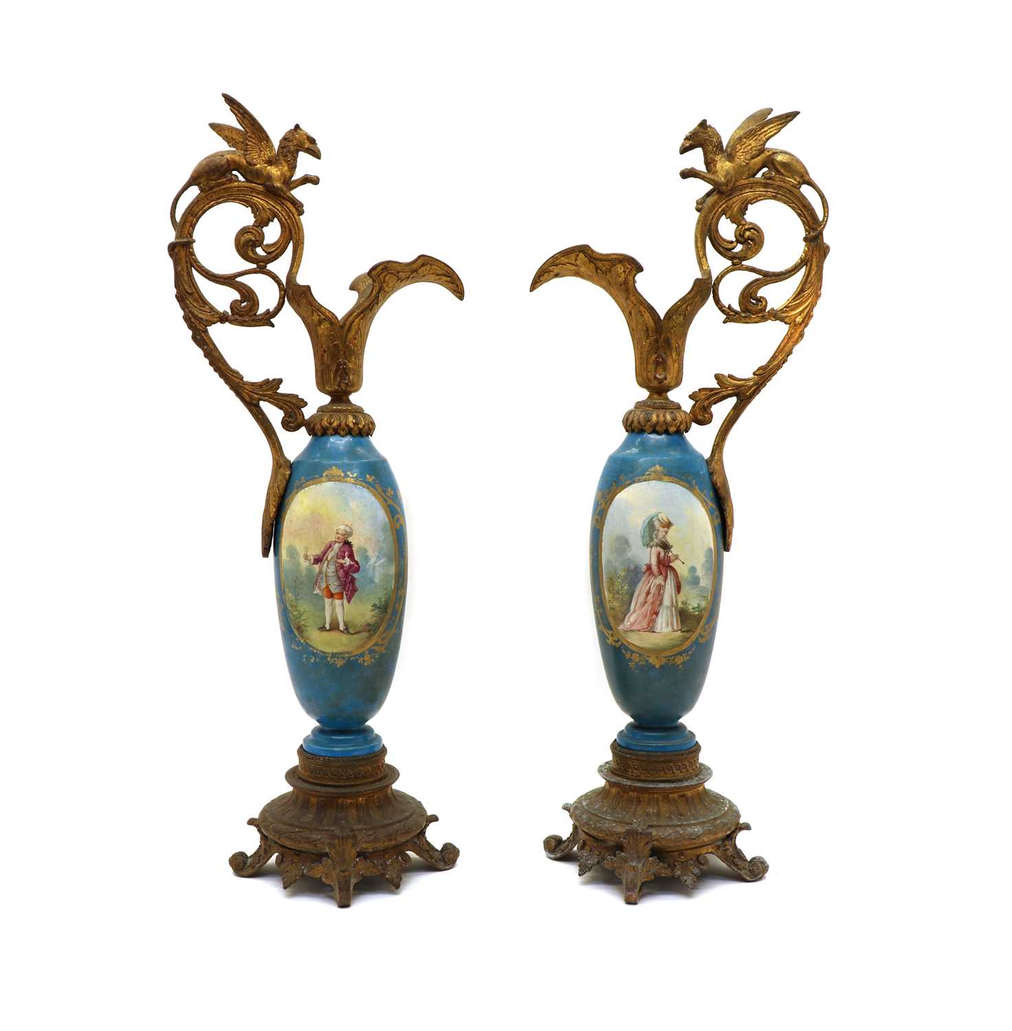 Lot 95 - A pair of single handled Sèvres style vases