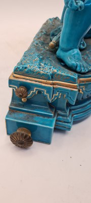 Lot 67 - A Continental faience table clock
