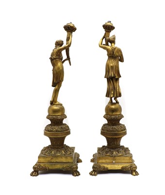 Lot 97 - A pair of figural bronze table lamps