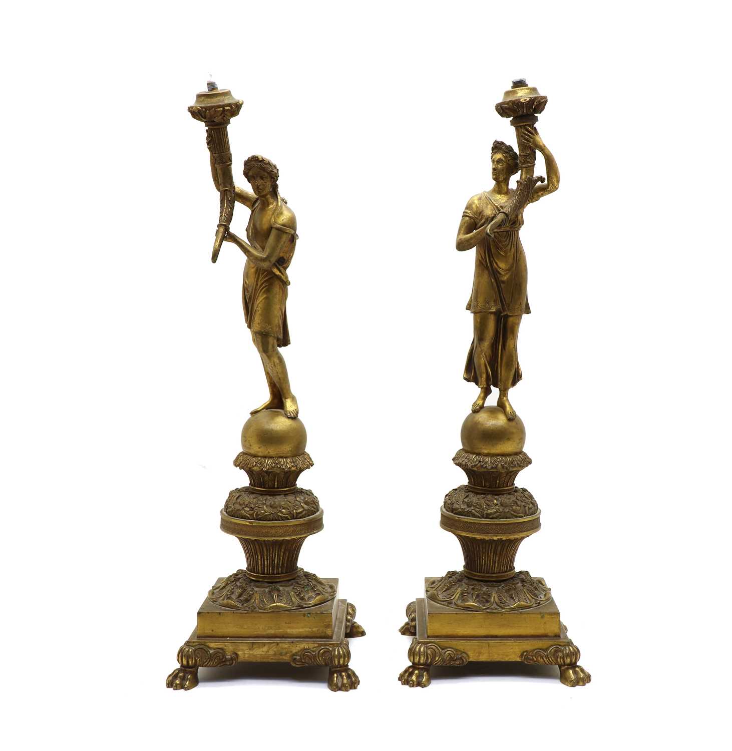 Lot 97 - A pair of figural bronze table lamps