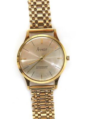 Lot 489 - A mid-size 9ct gold Accurist mechanical bracelet watch