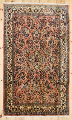 Lot 496 - A Persian Sarouk wool rug