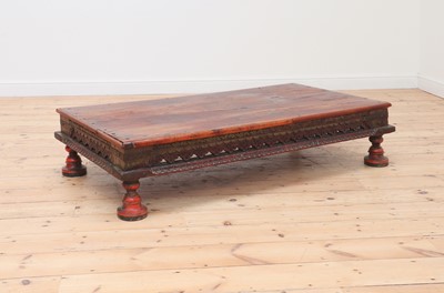 Lot 14 - An Indian hardwood low coffee table