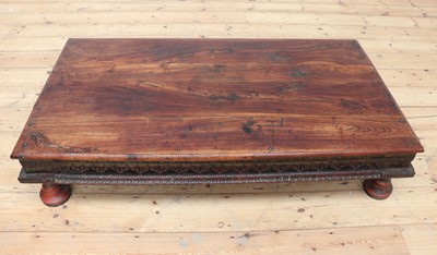 Lot 14 - An Indian hardwood low coffee table