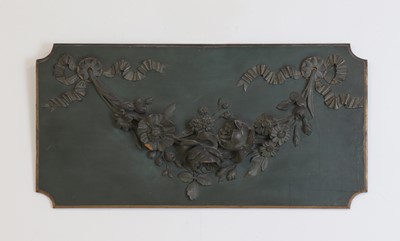 Lot 136 - A painted and carved panel
