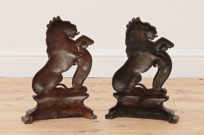 Lot 68 - A pair of cast iron and painted door porters