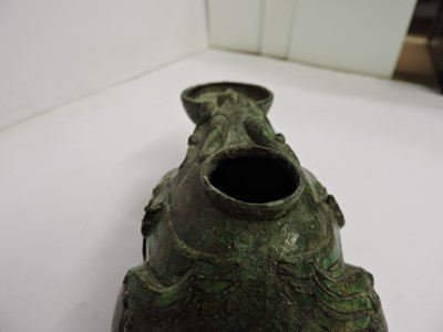 Lot 108 - A Chinese bronze water dropper