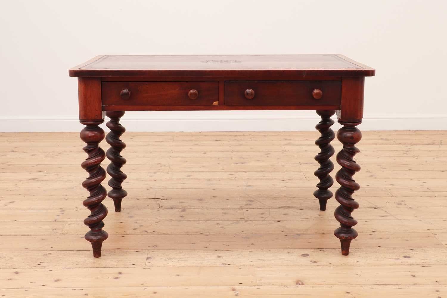 Lot 44 - A Victorian walnut writing table