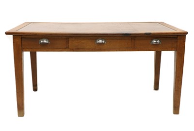 Lot 343 - A large utilitarian oak writing table