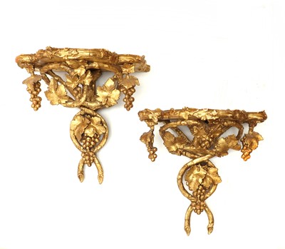 Lot 89 - A pair of giltwood and gesso wall brackets